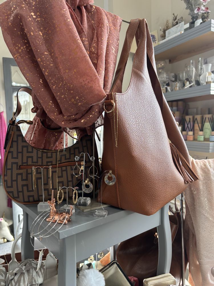 Leather handbags on display in the shop